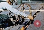 Image of Double torch cutting deck plates for Liberty ship under construction California United States USA, 1942, second 58 stock footage video 65675025804