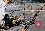 Image of Double torch cutting deck plates for Liberty ship under construction California United States USA, 1942, second 61 stock footage video 65675025804