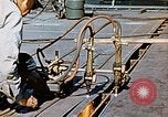 Image of Double torch cutting deck plates for Liberty ship under construction California United States USA, 1942, second 62 stock footage video 65675025804