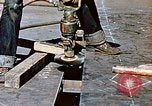Image of Liberty ship deck plates are prepared for union melt at shipyard California United States USA, 1942, second 10 stock footage video 65675025805