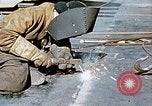Image of Liberty ship deck plates are prepared for union melt at shipyard California United States USA, 1942, second 16 stock footage video 65675025805