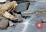 Image of Liberty ship deck plates are prepared for union melt at shipyard California United States USA, 1942, second 17 stock footage video 65675025805