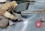 Image of Liberty ship deck plates are prepared for union melt at shipyard California United States USA, 1942, second 18 stock footage video 65675025805