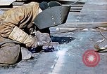 Image of Liberty ship deck plates are prepared for union melt at shipyard California United States USA, 1942, second 19 stock footage video 65675025805