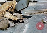 Image of Liberty ship deck plates are prepared for union melt at shipyard California United States USA, 1942, second 23 stock footage video 65675025805