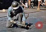 Image of Liberty ship deck plates are prepared for union melt at shipyard California United States USA, 1942, second 31 stock footage video 65675025805