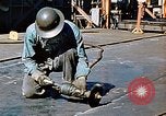 Image of Liberty ship deck plates are prepared for union melt at shipyard California United States USA, 1942, second 34 stock footage video 65675025805