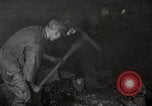 Image of process to get coal chunks in mine United States USA, 1922, second 9 stock footage video 65675025808