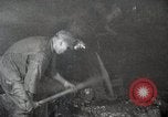 Image of process to get coal chunks in mine United States USA, 1922, second 11 stock footage video 65675025808