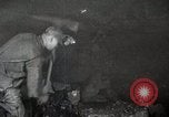 Image of process to get coal chunks in mine United States USA, 1922, second 15 stock footage video 65675025808