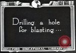 Image of process to get coal chunks in mine United States USA, 1922, second 18 stock footage video 65675025808