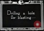 Image of process to get coal chunks in mine United States USA, 1922, second 19 stock footage video 65675025808