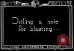 Image of process to get coal chunks in mine United States USA, 1922, second 23 stock footage video 65675025808