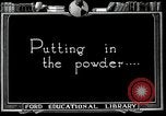 Image of process to get coal chunks in mine United States USA, 1922, second 35 stock footage video 65675025808