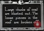 Image of process to get coal chunks in mine United States USA, 1922, second 56 stock footage video 65675025808