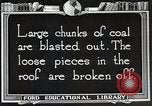 Image of process to get coal chunks in mine United States USA, 1922, second 57 stock footage video 65675025808
