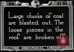 Image of process to get coal chunks in mine United States USA, 1922, second 60 stock footage video 65675025808
