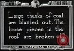 Image of process to get coal chunks in mine United States USA, 1922, second 61 stock footage video 65675025808
