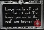Image of process to get coal chunks in mine United States USA, 1922, second 62 stock footage video 65675025808