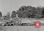 Image of Oliver tractor plows field Michigan United States USA, 1941, second 18 stock footage video 65675025822