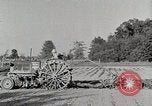Image of Oliver tractor plows field Michigan United States USA, 1941, second 21 stock footage video 65675025822
