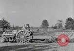 Image of Oliver tractor plows field Michigan United States USA, 1941, second 24 stock footage video 65675025822