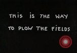 Image of Oliver tractor plows field Michigan United States USA, 1941, second 34 stock footage video 65675025822