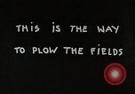 Image of Oliver tractor plows field Michigan United States USA, 1941, second 38 stock footage video 65675025822