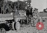 Image of Oliver tractor plows field Michigan United States USA, 1941, second 40 stock footage video 65675025822