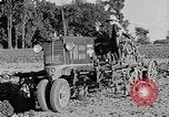 Image of Oliver tractor plows field Michigan United States USA, 1941, second 41 stock footage video 65675025822