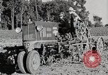 Image of Oliver tractor plows field Michigan United States USA, 1941, second 42 stock footage video 65675025822