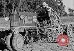 Image of Oliver tractor plows field Michigan United States USA, 1941, second 43 stock footage video 65675025822