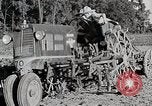 Image of Oliver tractor plows field Michigan United States USA, 1941, second 44 stock footage video 65675025822