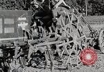 Image of Oliver tractor plows field Michigan United States USA, 1941, second 47 stock footage video 65675025822