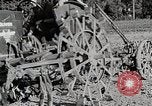 Image of Oliver tractor plows field Michigan United States USA, 1941, second 48 stock footage video 65675025822