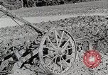 Image of Oliver tractor plows field Michigan United States USA, 1941, second 54 stock footage video 65675025822