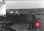 Image of Sightseers look at zeppelin wreckage displayed on dock  Salonica Greece, 1916, second 3 stock footage video 65675025842