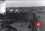 Image of Sightseers look at zeppelin wreckage displayed on dock  Salonica Greece, 1916, second 6 stock footage video 65675025842