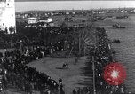 Image of Sightseers look at zeppelin wreckage displayed on dock  Salonica Greece, 1916, second 10 stock footage video 65675025842