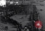 Image of Sightseers look at zeppelin wreckage displayed on dock  Salonica Greece, 1916, second 17 stock footage video 65675025842