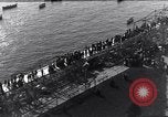 Image of Sightseers look at zeppelin wreckage displayed on dock  Salonica Greece, 1916, second 23 stock footage video 65675025842
