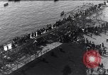 Image of Sightseers look at zeppelin wreckage displayed on dock  Salonica Greece, 1916, second 27 stock footage video 65675025842