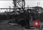 Image of Sightseers look at zeppelin wreckage displayed on dock  Salonica Greece, 1916, second 45 stock footage video 65675025842