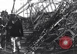 Image of Sightseers look at zeppelin wreckage displayed on dock  Salonica Greece, 1916, second 47 stock footage video 65675025842