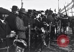 Image of Sightseers look at zeppelin wreckage displayed on dock  Salonica Greece, 1916, second 59 stock footage video 65675025842
