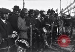 Image of Sightseers look at zeppelin wreckage displayed on dock  Salonica Greece, 1916, second 60 stock footage video 65675025842