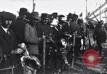 Image of Sightseers look at zeppelin wreckage displayed on dock  Salonica Greece, 1916, second 61 stock footage video 65675025842