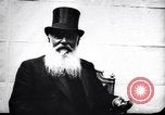 Image of procession of officials in automobiles Vienna Austria, 1912, second 1 stock footage video 65675025870