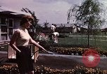 Standbild Suburbia und suburbanen Lebensstil in Levittown Bucks County Pennsylvania United States USA, 1959, aus Sekunde 39 historischem Filmmaterial Videoclip 65675025921