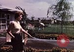 Standbild Suburbia und suburbanen Lebensstil in Levittown Bucks County Pennsylvania United States USA, 1959, aus Sekunde 45 historischem Filmmaterial Videoclip 65675025921